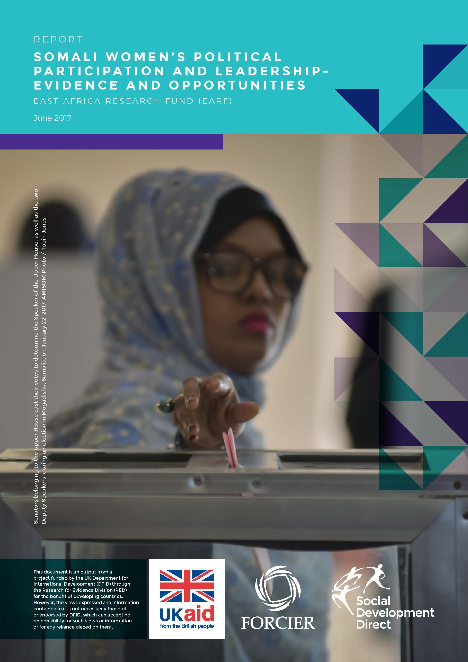 Somali woman posting vote into ballot box