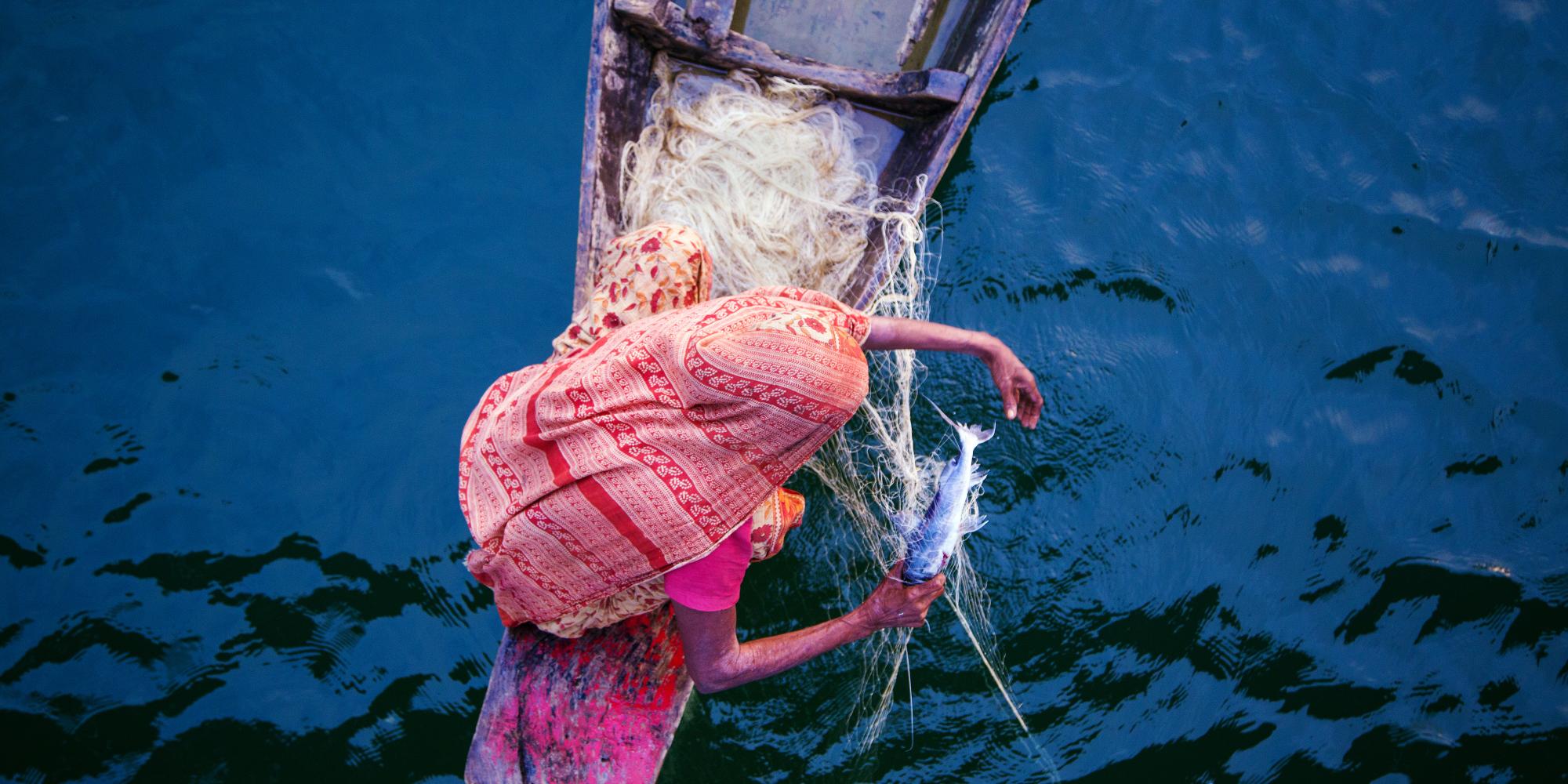 An image of a woman fishing